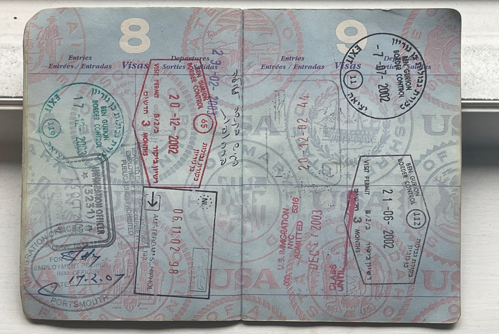 Pages shown featuring entry and exit stamps from my first passport.